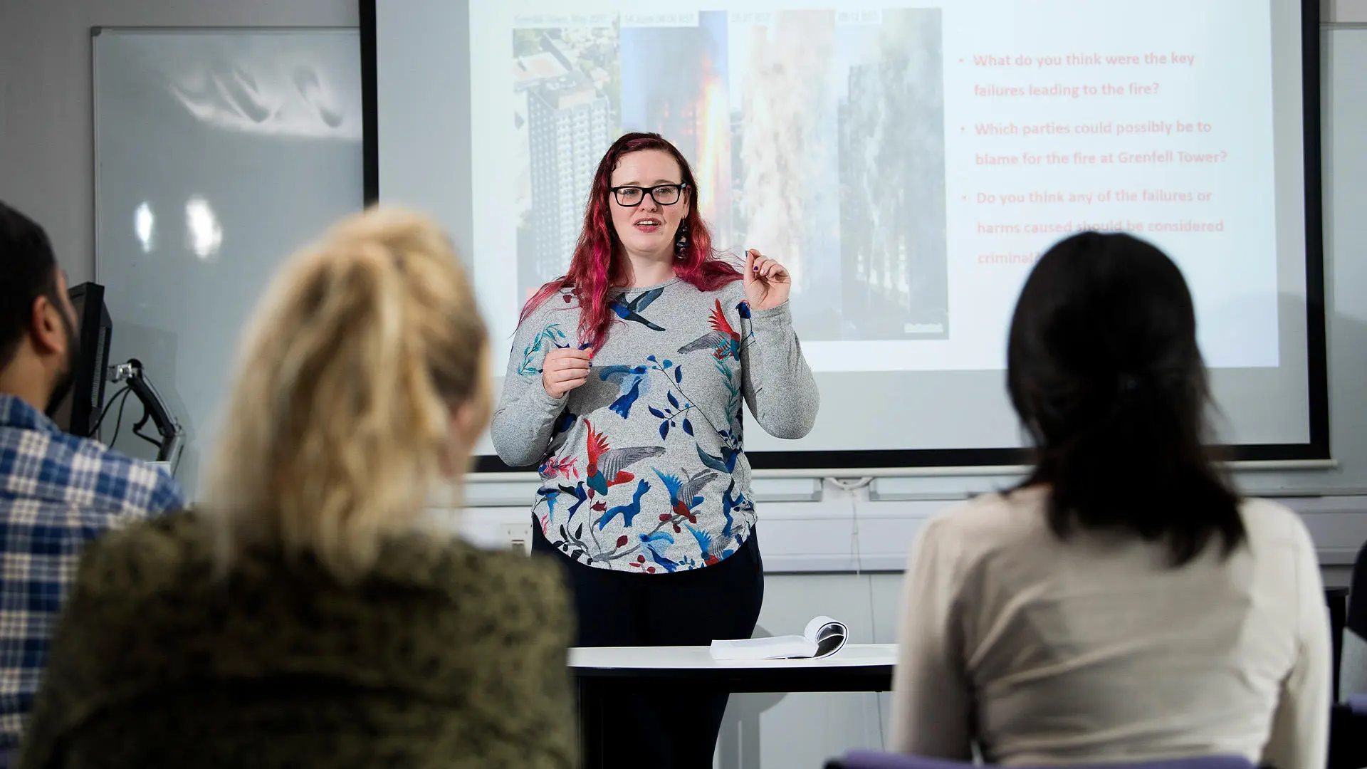 Student presenting in front of a class