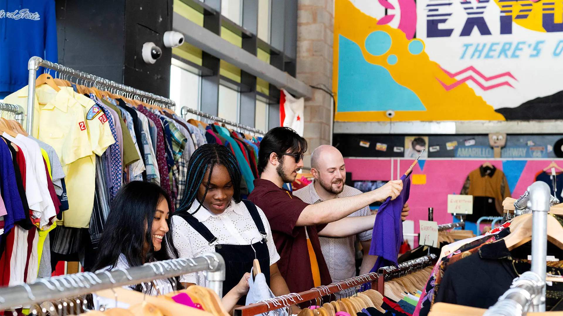 Students shopping in vintage clothes shop Hollywood Exports, Preston