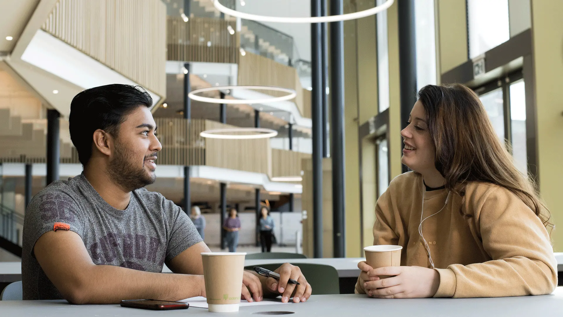 Students using social and study spaces in the student centre