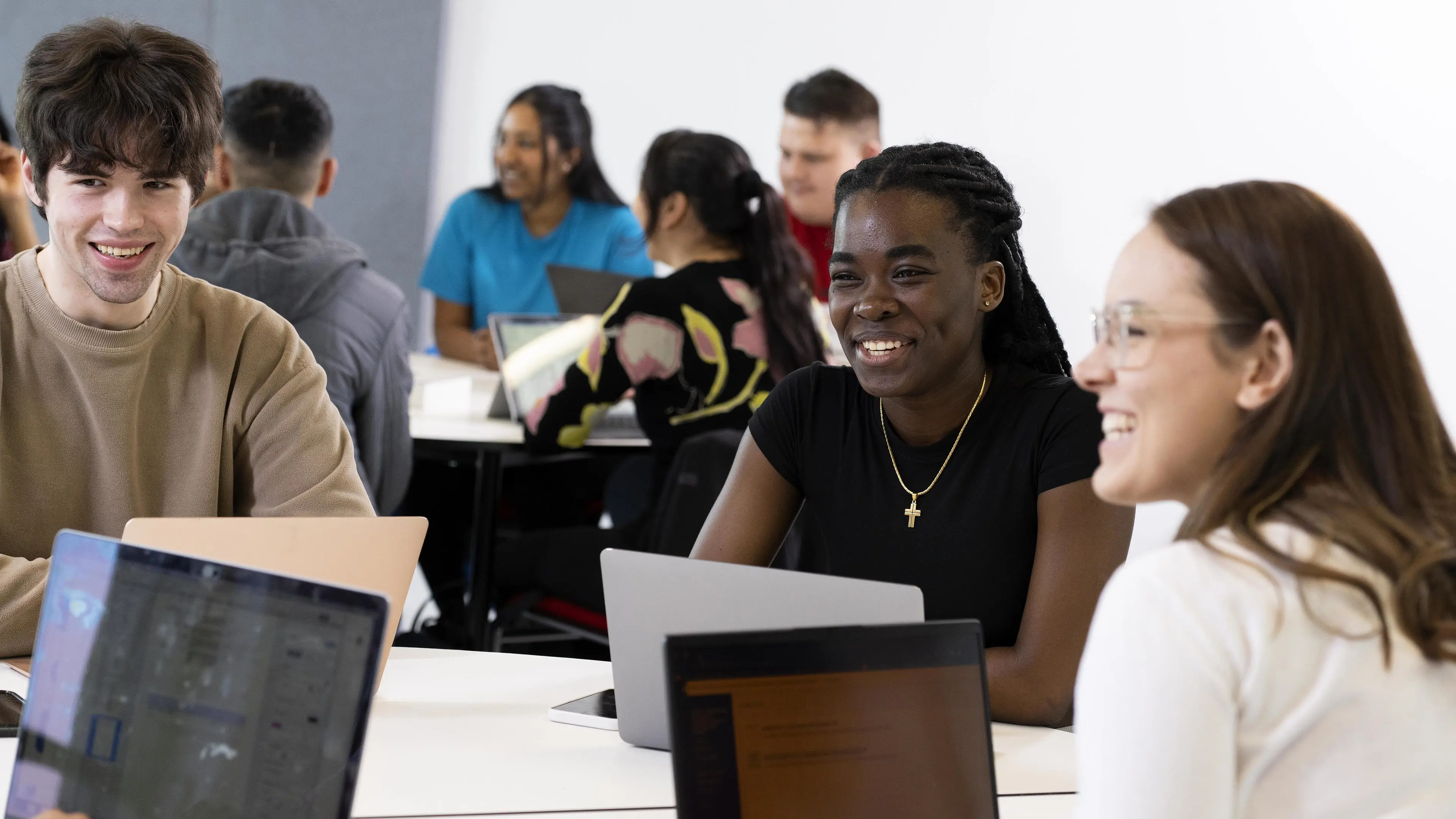 students in classroom chatting